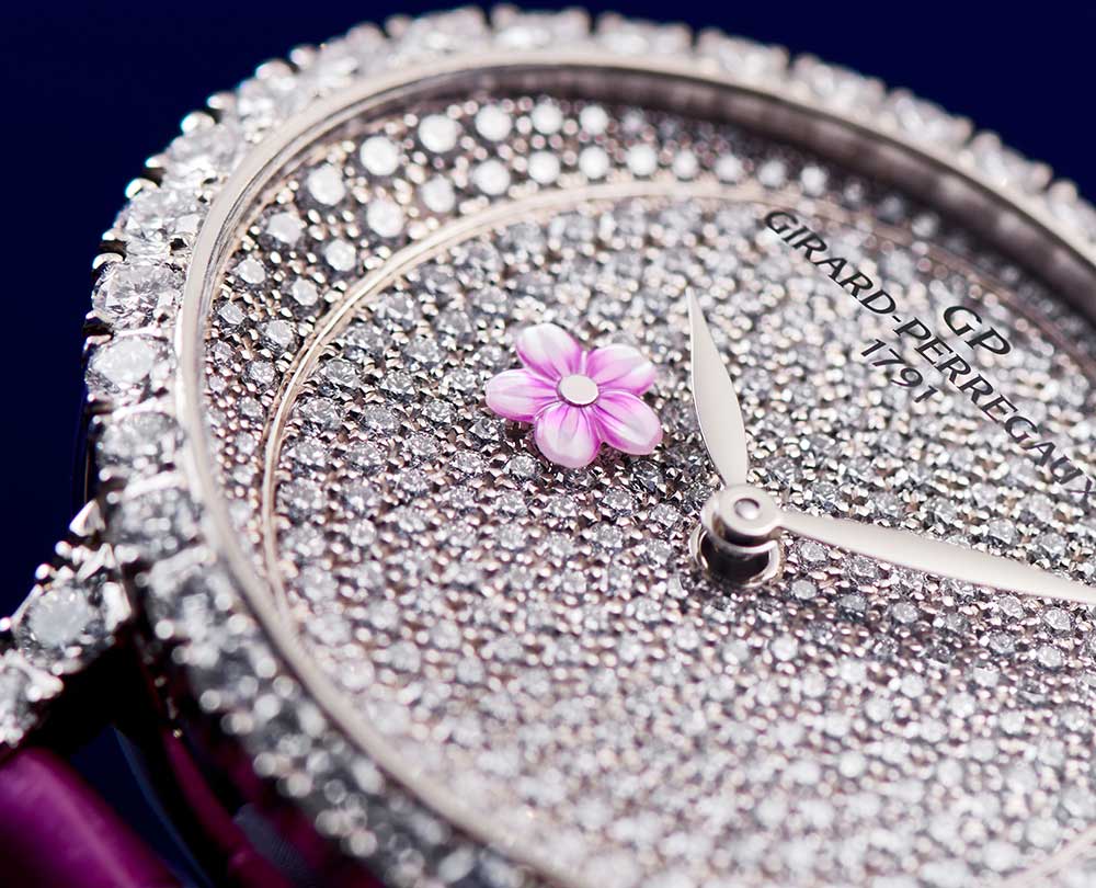 girard perregaux cat eye plum blossom closeup