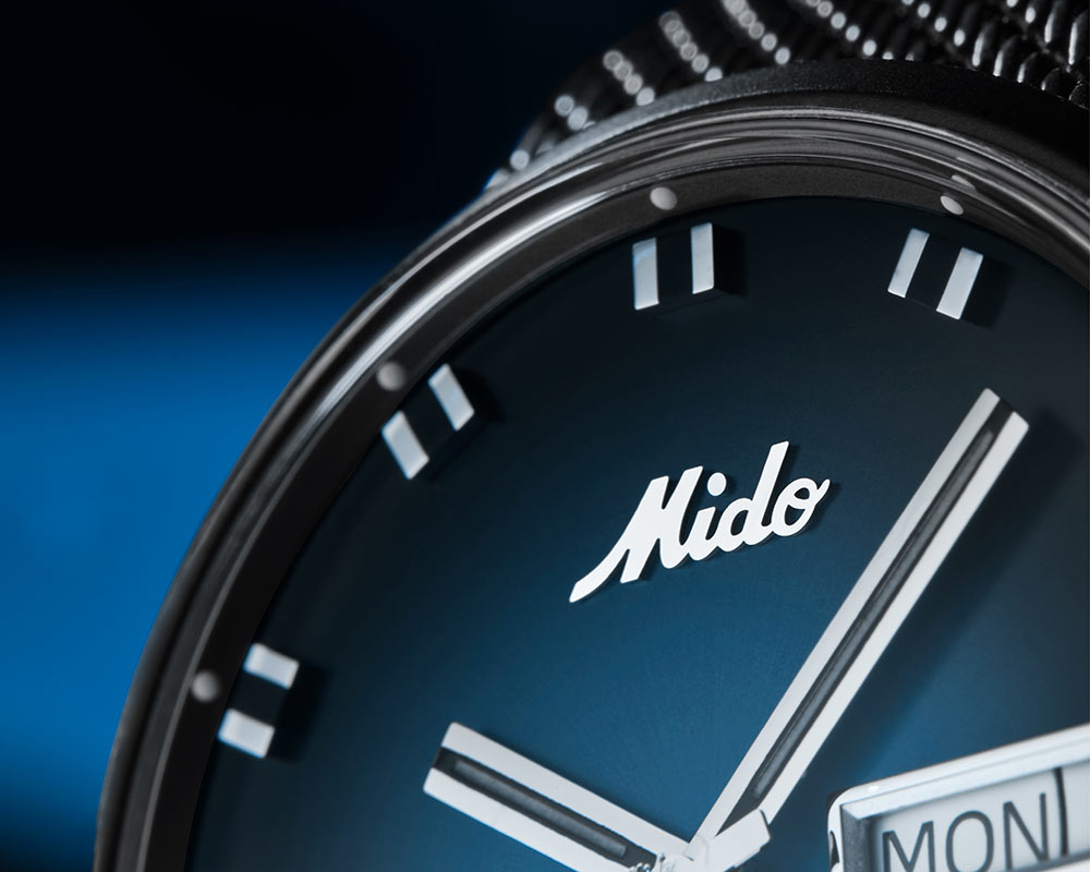 mido commander blue shade closeup high dial